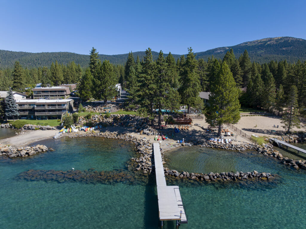 Red Wolf Lakeside Lodge property view from the water during summer vacation