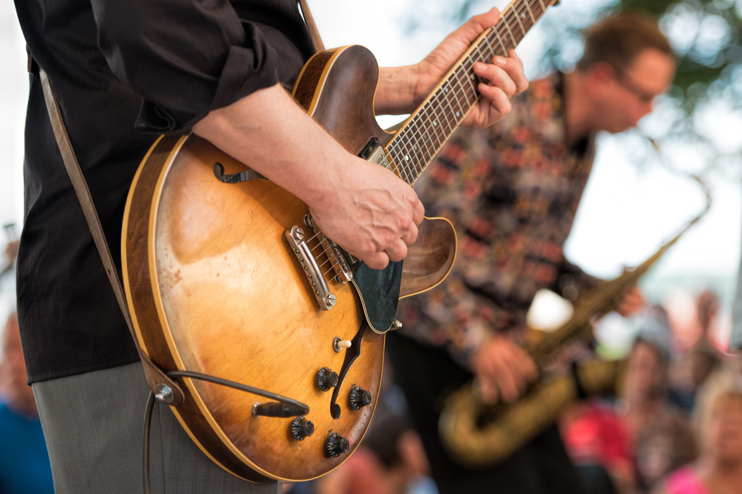 Person playing guitar - live music in north lake tahoe