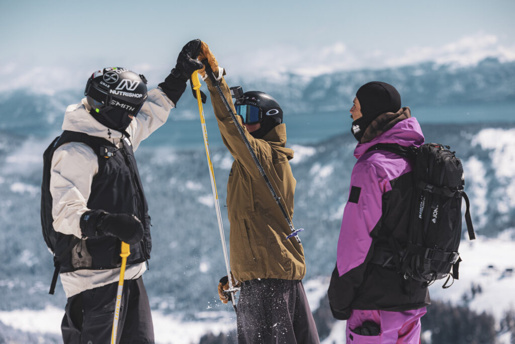 Group of friends skiing on the top of palisades Tahoe